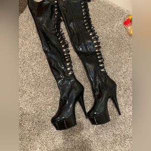 Platform tie and zipper boots by Pleaser